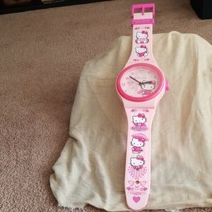 Gently used Hello Kitty watch wall clock